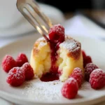 Gluten-Free White Chocolate Lava Cake With Raspberries First Image First Image